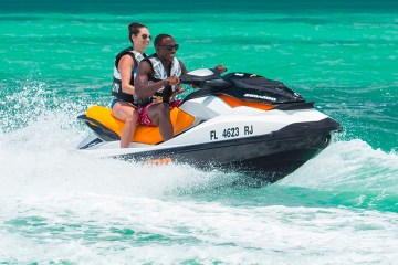 a man riding a jetski in the water